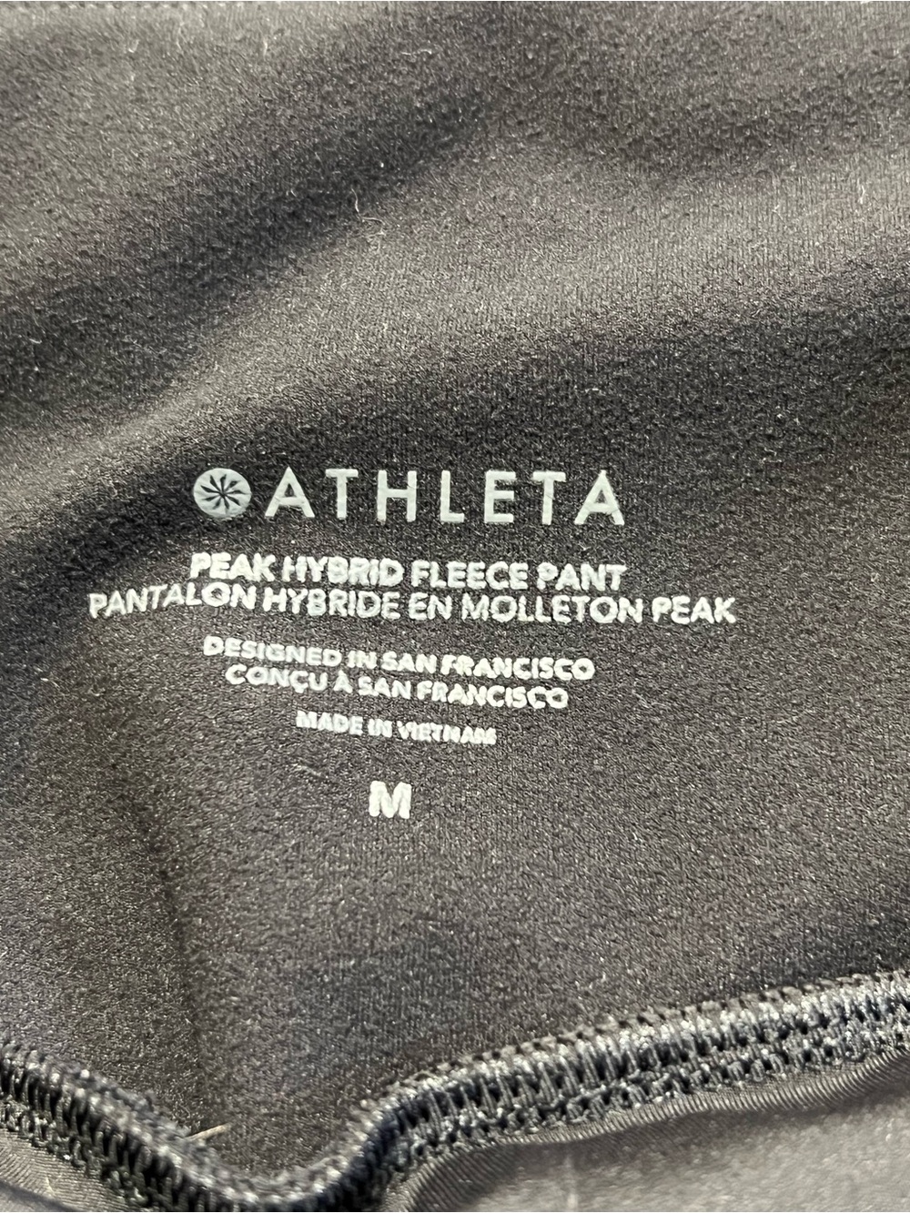 EUC Athleta Peak Hybrid Fleece Flare Black Pants | Size Medium - Picture 9 of 11